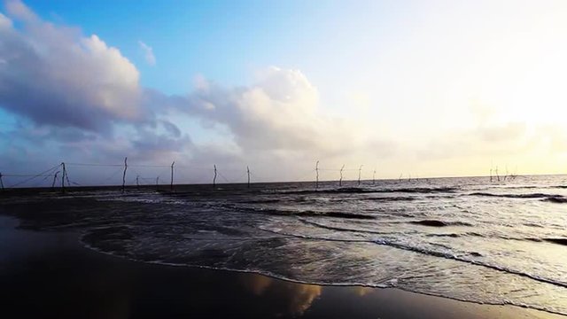 Locked-on Shot Of Waves Moving On The Beach, Surat, Gujarat, India