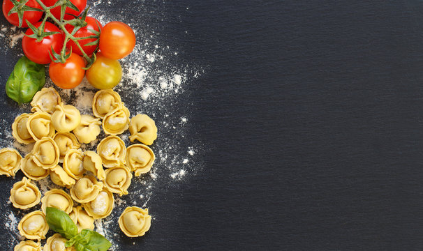 Fresh tortellini with basil ad tomatoes