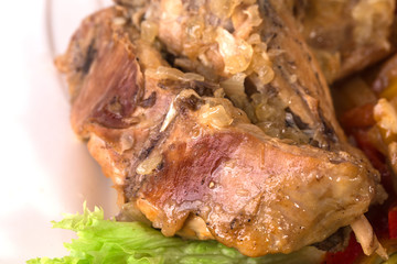 Roasted pork meat with lettuce.