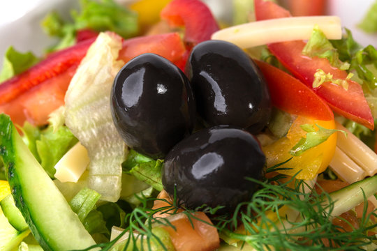 Fresh vegetable salad with olives.