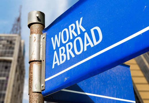 Work Abroad Written On Road Sign