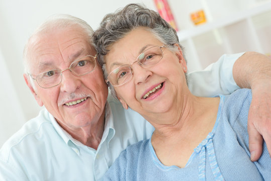 elderly couple smiling