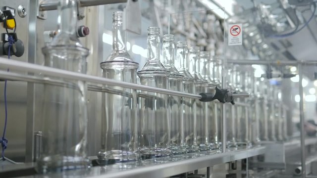 Vodka or gin or tequila production. Bottles on line.