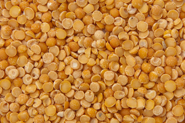 Dry yellow peas texture background