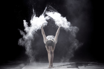 Girl dancing with a flour