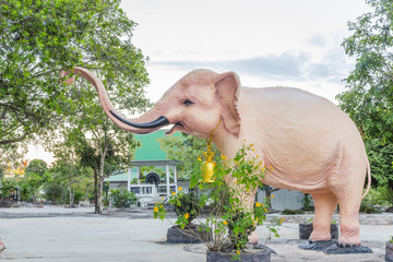 The Pink Elephant statue and Trees background
