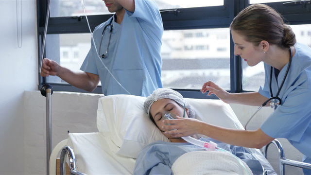 Female patient receiving artificial ventilation 
