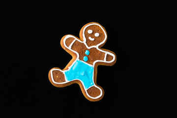 Gingerbread man on black velvet
