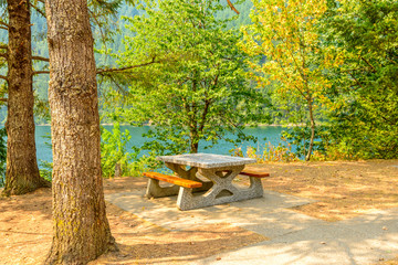 A picnic table with gorgeous view at Lake Of The Woods, British Columbia, Canada.