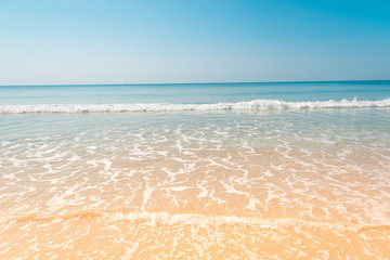 Fototapeta na wymiar Clearly nice blue sea blue sky and yellow beach in summer of Tha