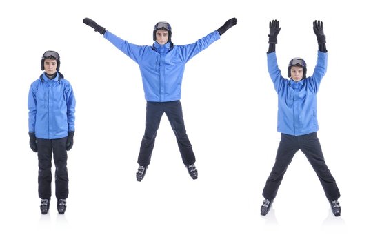 Skiier demonstrate warm up exercise for skiing. The Jumping Jack