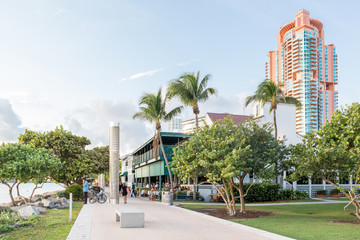 Promenade with people in South Pointe Park and Portofino Tower, South Beach district of Miami Beach, Florida, USA