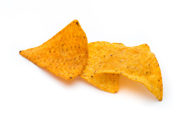 Fototapeta premium Mexican nachos chips, isolated on white background.