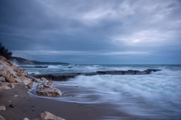 Beauty long exposure cloudy seascape at the Black Sea coast, Bulgaria with stones and rocks