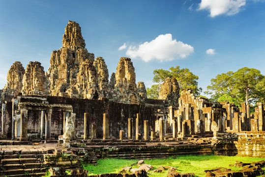 Stone faces of ancient Bayon temple in Angkor Thom, Cambodia