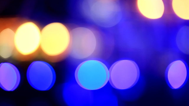Blurred, bokeh lights background. Abstract sparkles.