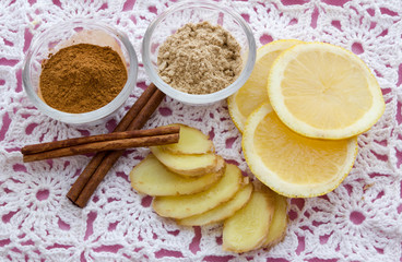 Fototapeta na wymiar ginger lemons cinnamon, healthy foods for colds
