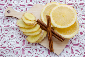 Obraz na płótnie Canvas ginger lemons cinnamon, healthy foods for colds