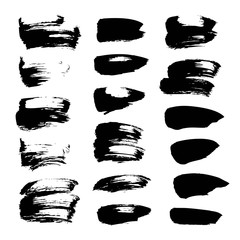 Abstract spots of black paint and ink isolated on a white backgr