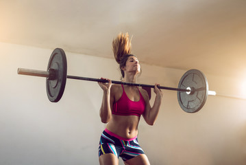 Girl doing weightlifting