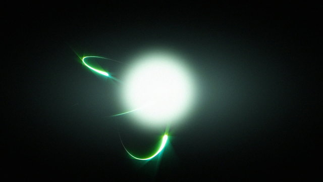 Subatomic Particle Orb (25fps). A flickering orb of light with streaks and light rays orbiting the main particle.