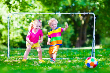 Kids playing football in school yard