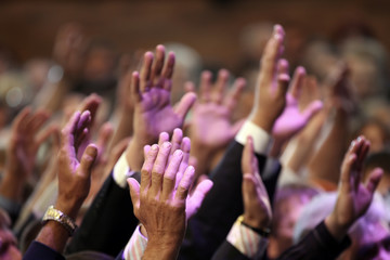 raised up a human hands at the event