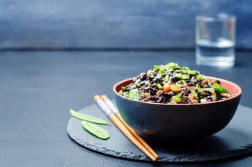 Black rice with snap peas and vegetables
