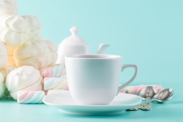 Fototapeta na wymiar Pastel marshmallow and tea cup