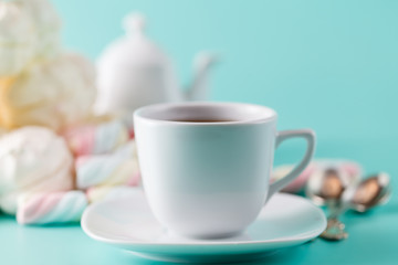 Coffee cup and pile sweet pastel colored marshmall