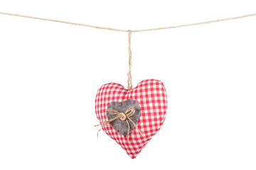 Checkered heart hanging a rope