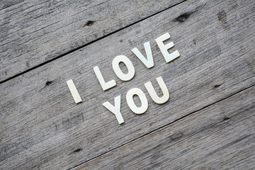 The word i love you on the wooden floor