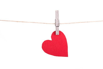 Red heart hanging a rope