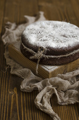 Chocolate cake with icing sugar     