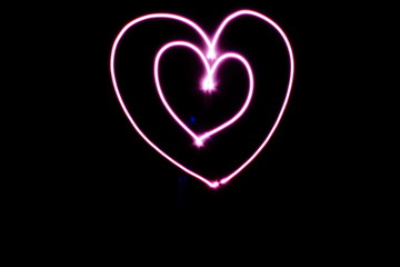 Pink hearts, made with light painting