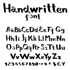 Handwritten font with a flat brush and ink