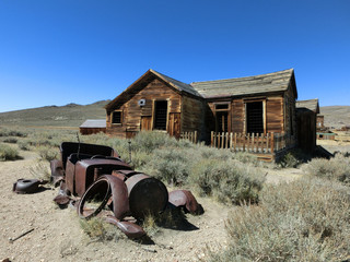Abandoned wooden farmhouse in ghost town Bodie, California - landscape photo
