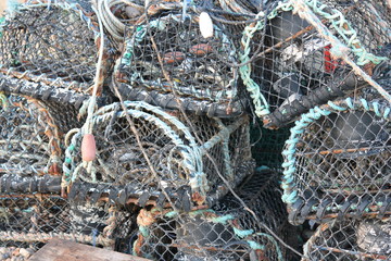 Lobster pot traps for fishing pile stack stock, photo, photograph, image, picture, press, 