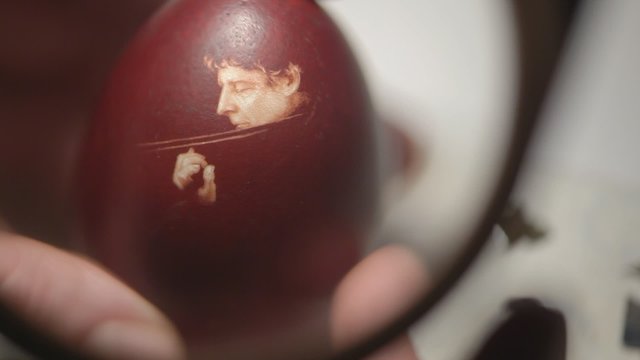 portrait depicts a violinist on the egg