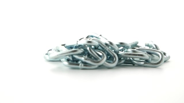 Closeup on silver chain  isolated on the white background