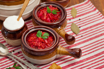 Borscht. Traditional Russian and Ukrainian national food - red beet soup. Selective focus.