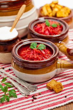 Borscht. Traditional Russian and Ukrainian national food - red beet soup. Selective focus.
