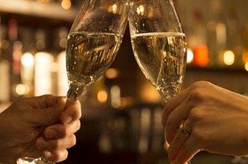 Men and women are toast with champagne