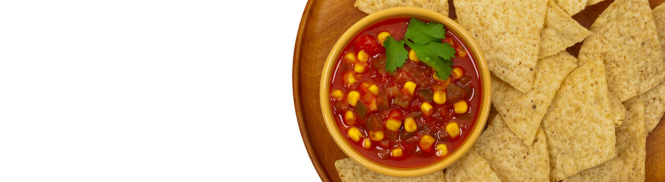 Chunky Salsa with Corn Isolated on white. Panoramic image. Selective focus.
