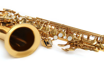 Golden saxophone isolated on white background, close up
