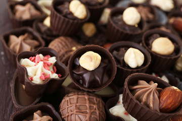 Delicious chocolate candies background, close up