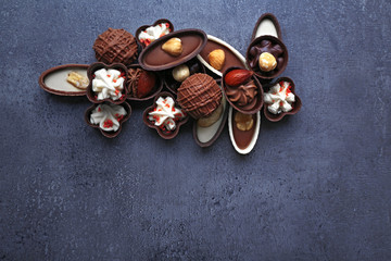 Chocolate sweets on dark grey background