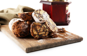 Chocolate salami candies and coffee-mill, close up