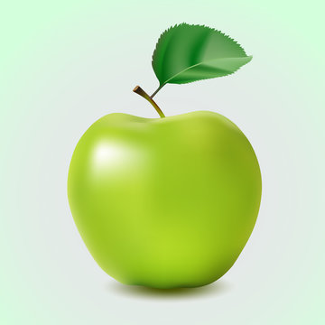 Green apple with leaf isolated on a blue background