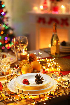 Christmas table setting with holiday decorations background